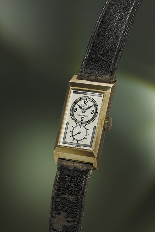 The Prince is a rare 9k yellow gold rectangular wristwatch with three-tone silvered dial